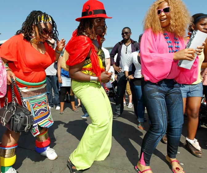 Dancing at Africa Day weekend festival in Georges Dock, Dublin Dancing at Africa Day weekend festival in Georges Dock, Dublin